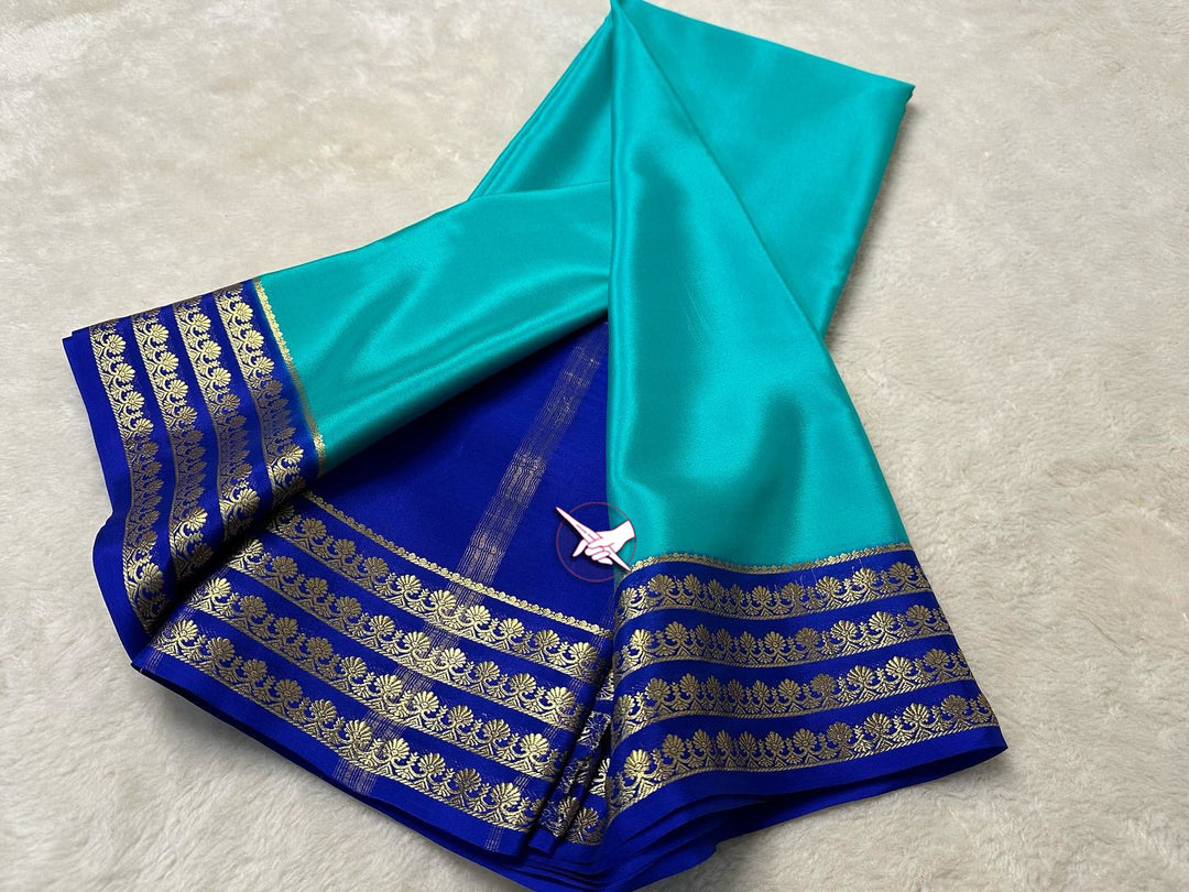 Vibrant Sky Blue Zari Border Soft Mysore Silk Saree For Special Occasions