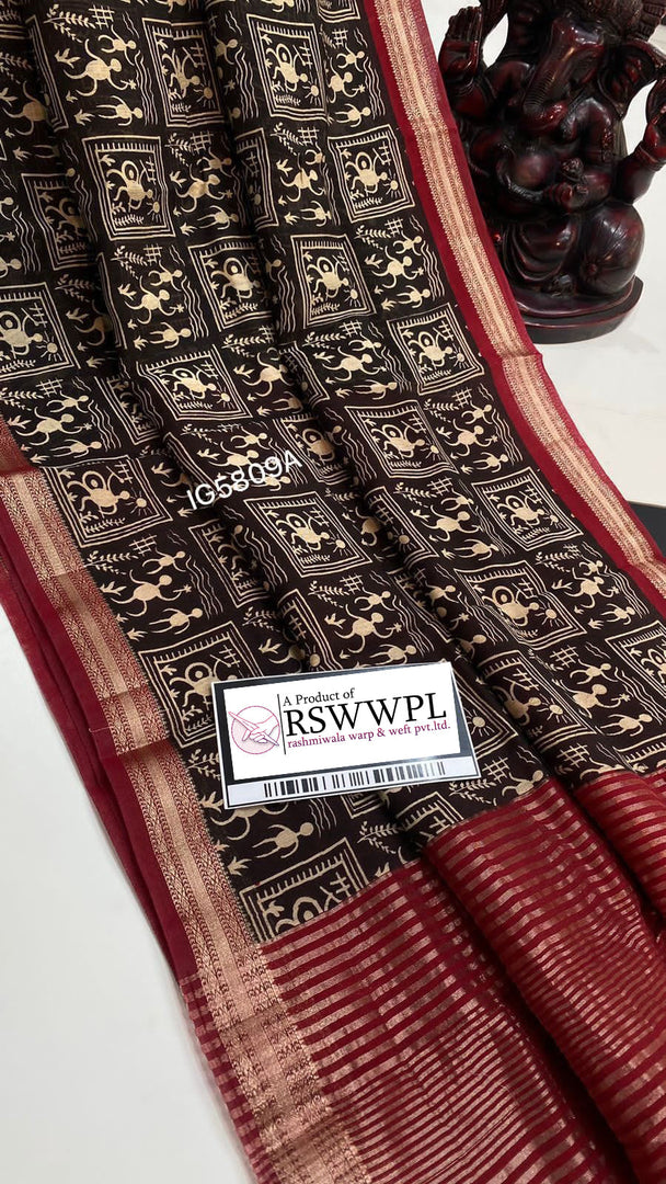 "Black Maheswari saree with Mangalagiri jari border, exuding elegance and tradition."
