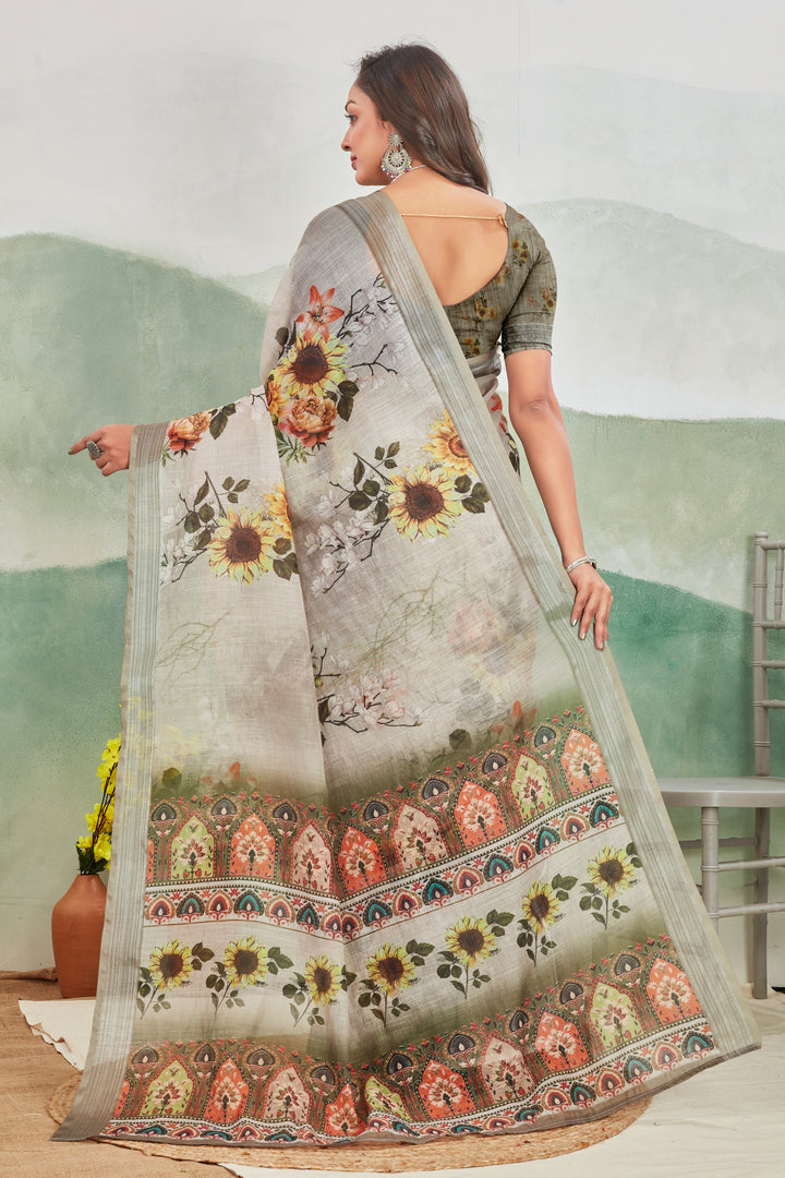 Subtle And Stylish Grey Linen Saree With Zari Lining And Prints