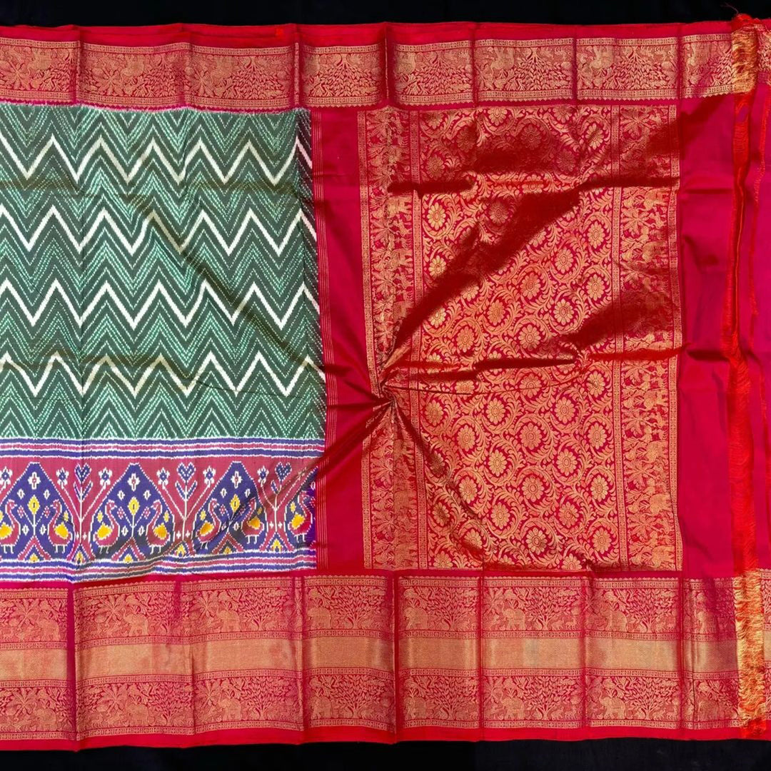 Sea Green Elegance Ikkat Style Kanchi Border Fancy Silk Saree