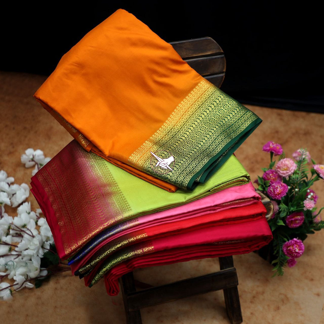 Plain Orange Mysore Silk Saree With Festive Zari Border And Matching Blouse