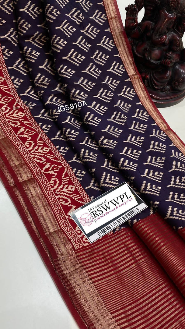 "Deep blue Maheswari saree with Mangalagiri jari border, exuding elegance and tradition."