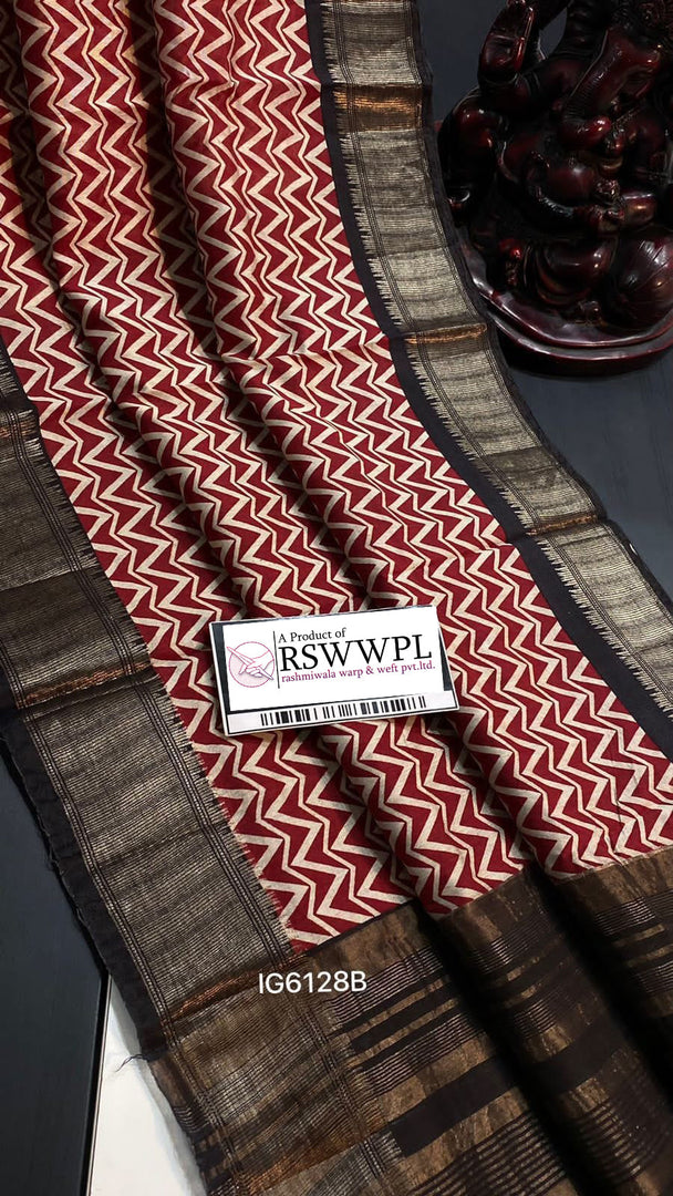 Rich red Narayanpet soft silk saree with earthy brown accents, a fusion of tradition and modern sophistication for graceful attire