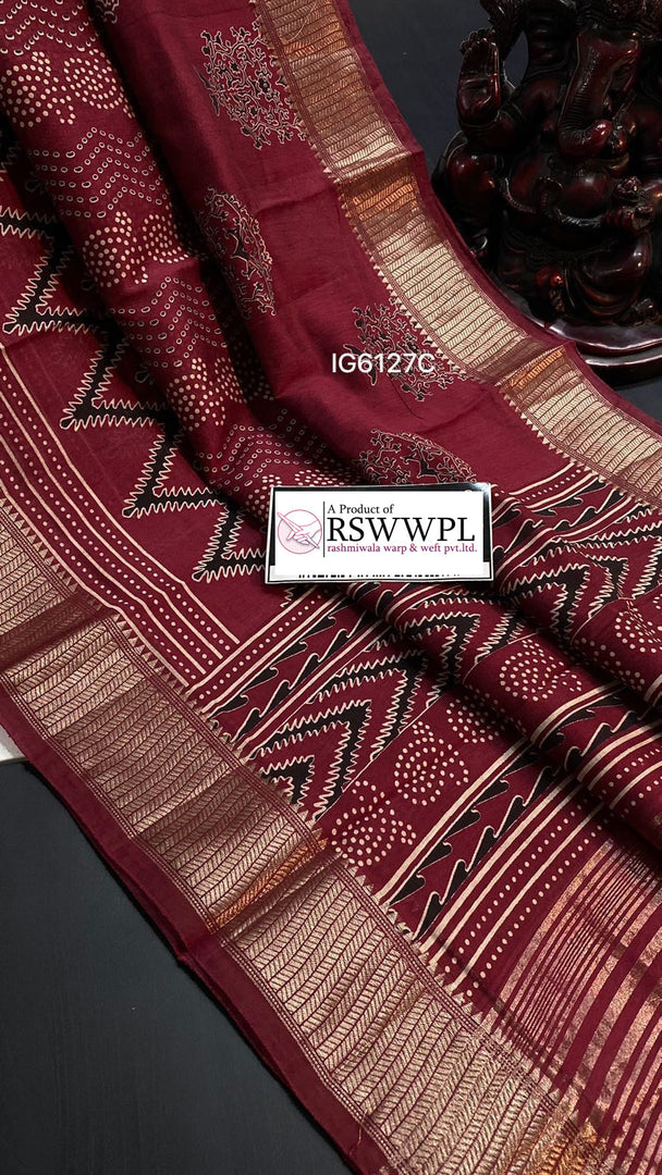 Red Pure handloom Maheswari print saree featuring a beautiful jari weaving border, blending traditional craftsmanship