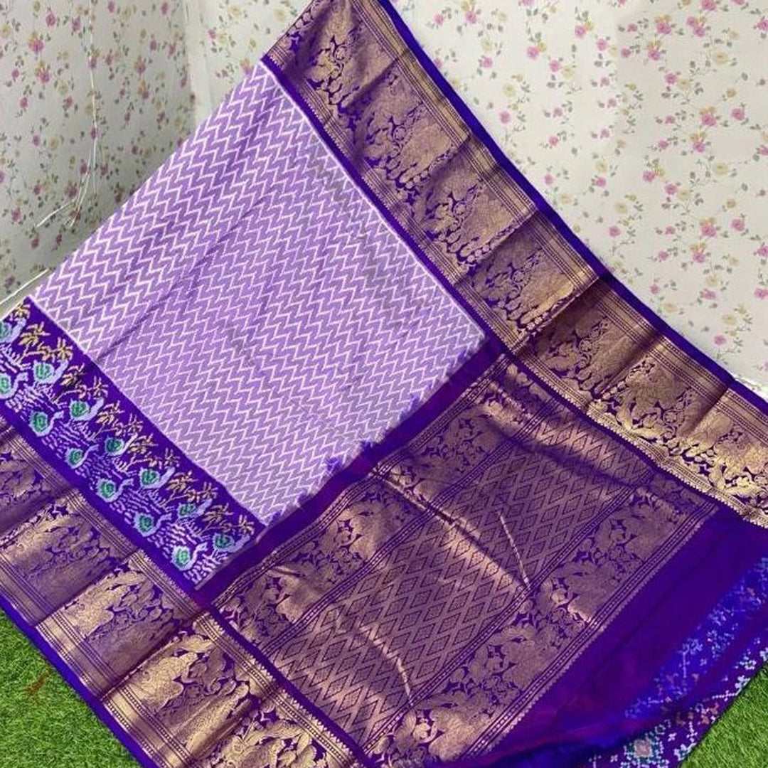 Lavender Color Exclusive Ikkat Kanchi Border Weaving Print Saree With Blouse