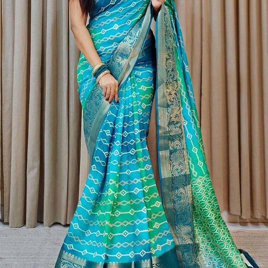 Opulent Light Green And Navy Blue Traditional Soft Silk Dola Saree With Artistic Digital Prints And Zari Work