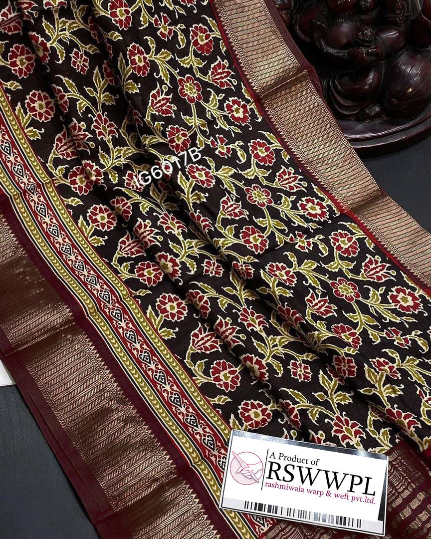 ELEGANCE BLACK SILK SAREE  WITH ALLOVER  FLORAL PRINTS AND ASSAMI PATTU