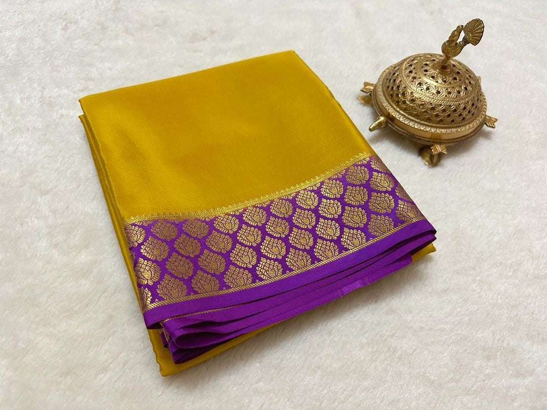 Mesmerizing Yellow And Purple Soft Silk Saree With Semi Mysore Weave And Zari Touch
