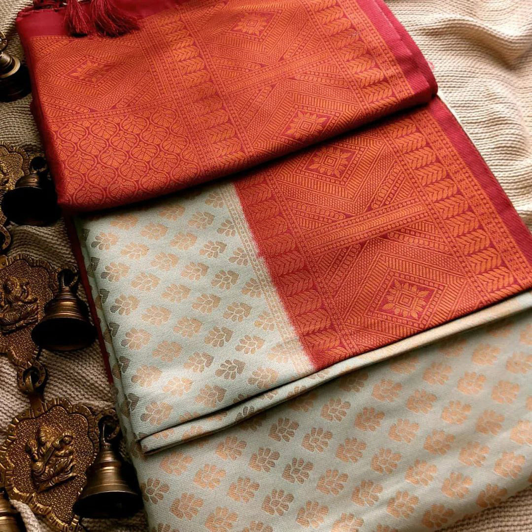 Off White And Red Soft Silk Weaving Work Saree With Unstitched Blouse